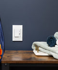 Deako Simple Dimmer switch on a home wall 